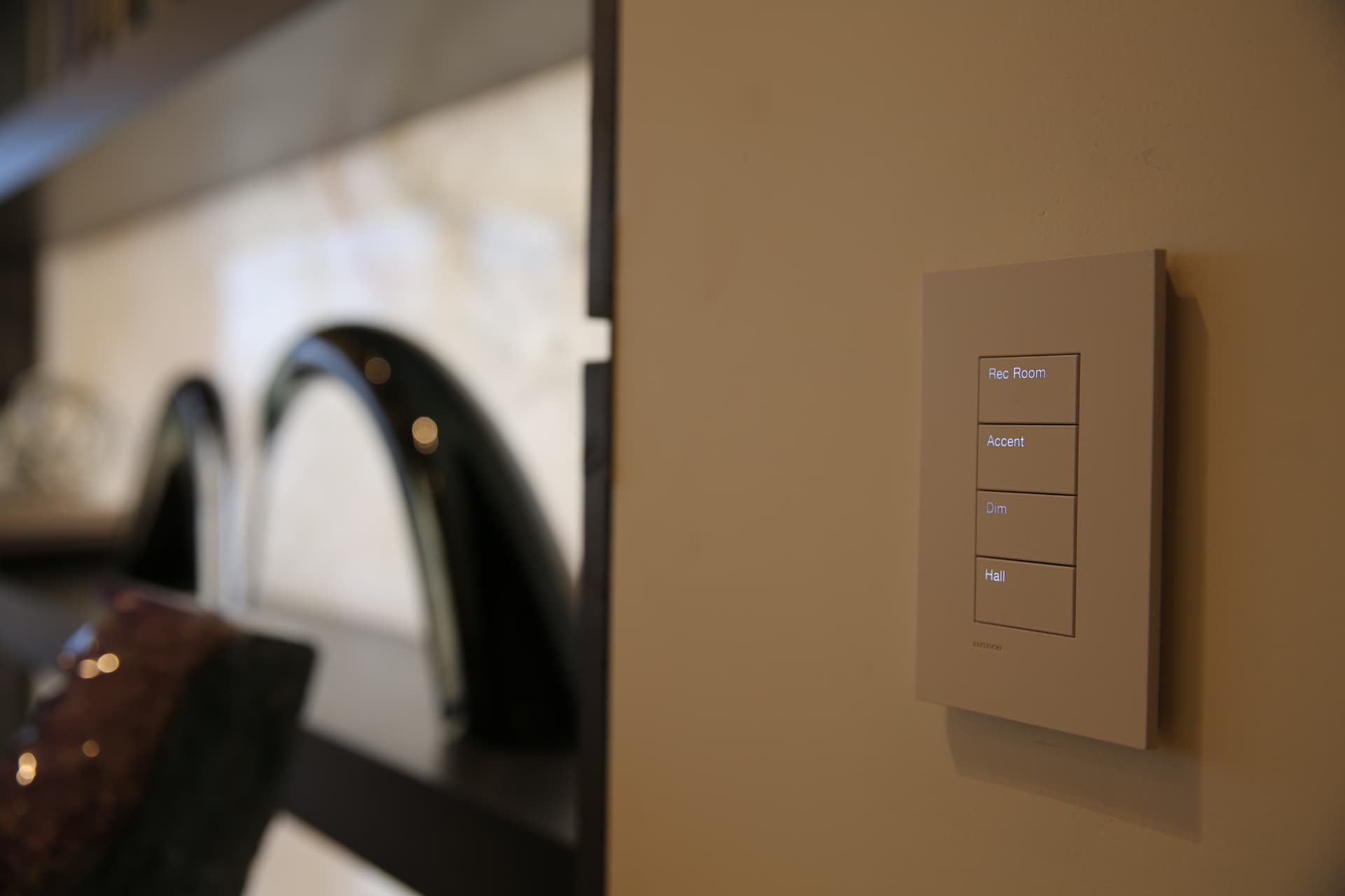 Backlit keypad engraved with Rec Room, Accent, Dim, and Hall scenes