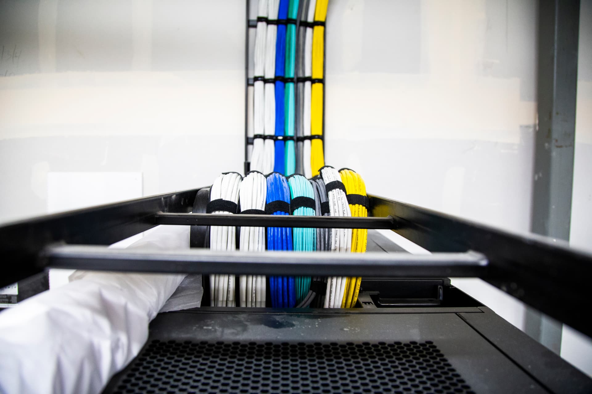 Labeled equipment rack with organized cable management